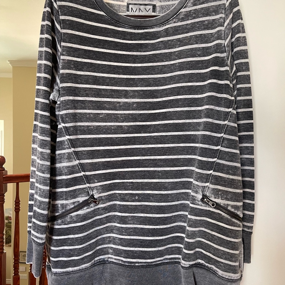 Performance top with cute embellishments.